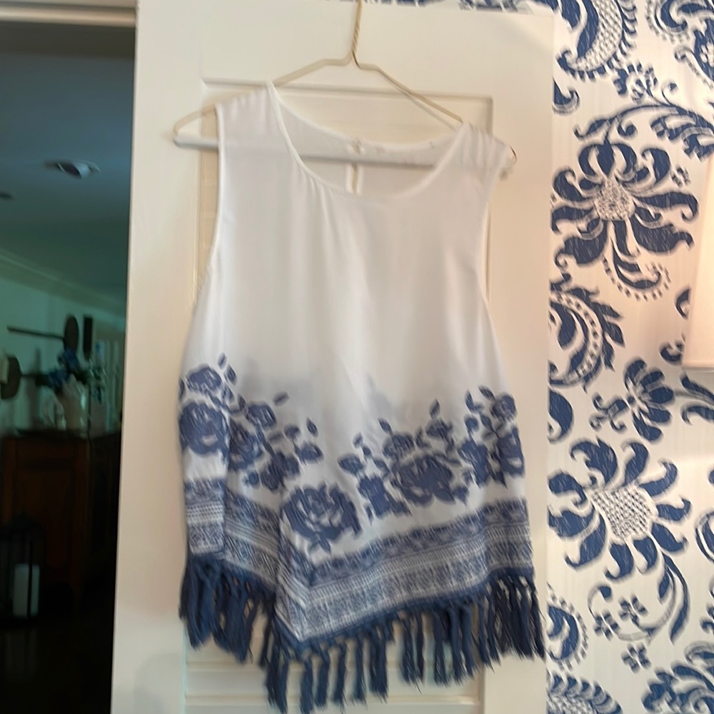 100% Viscose, slit on lower back bottom, very light weight